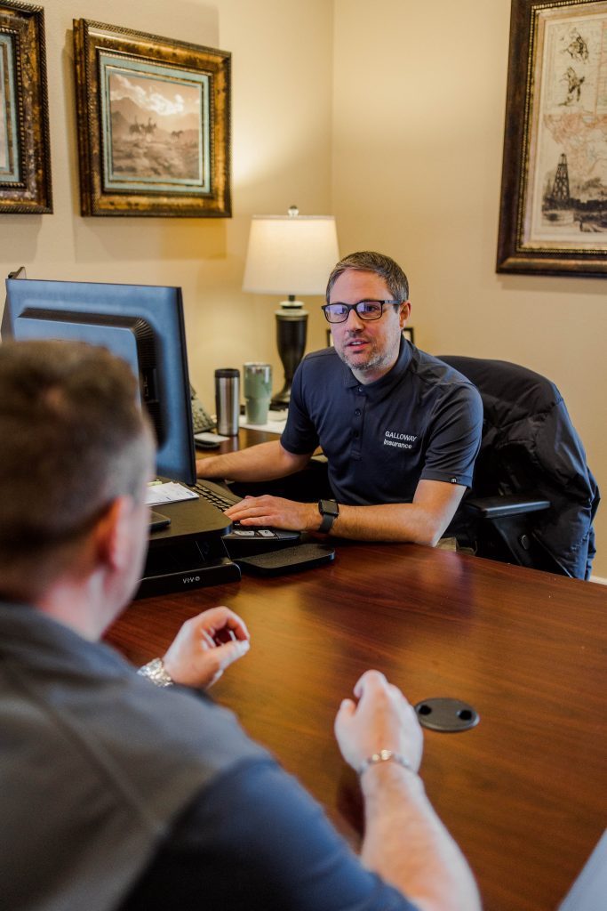 Galloway Insurance agent Ben Gillihan consulting with a client about Medicare supplement plans in Texas.